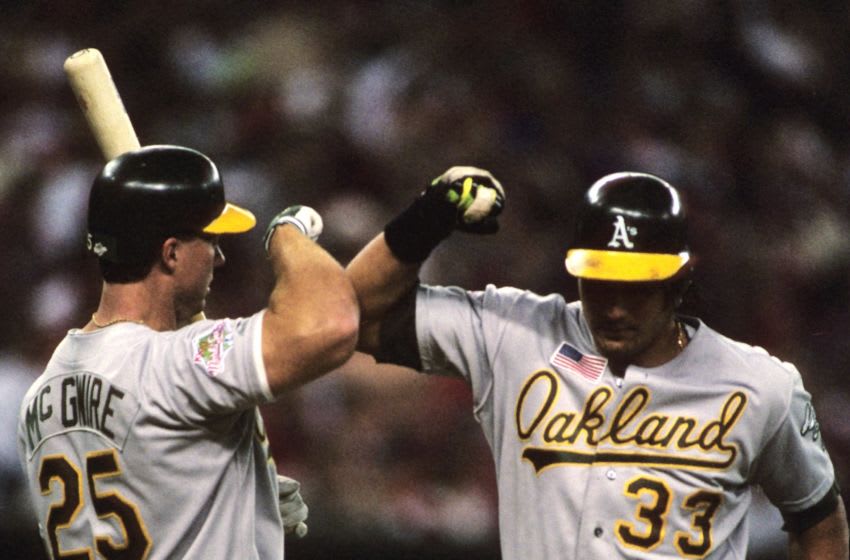 ■MLB Mark McGwire Jose Canseco Athletics Mark McGuire's ex-teammate, Jose Canseco, says he could've hit 900
