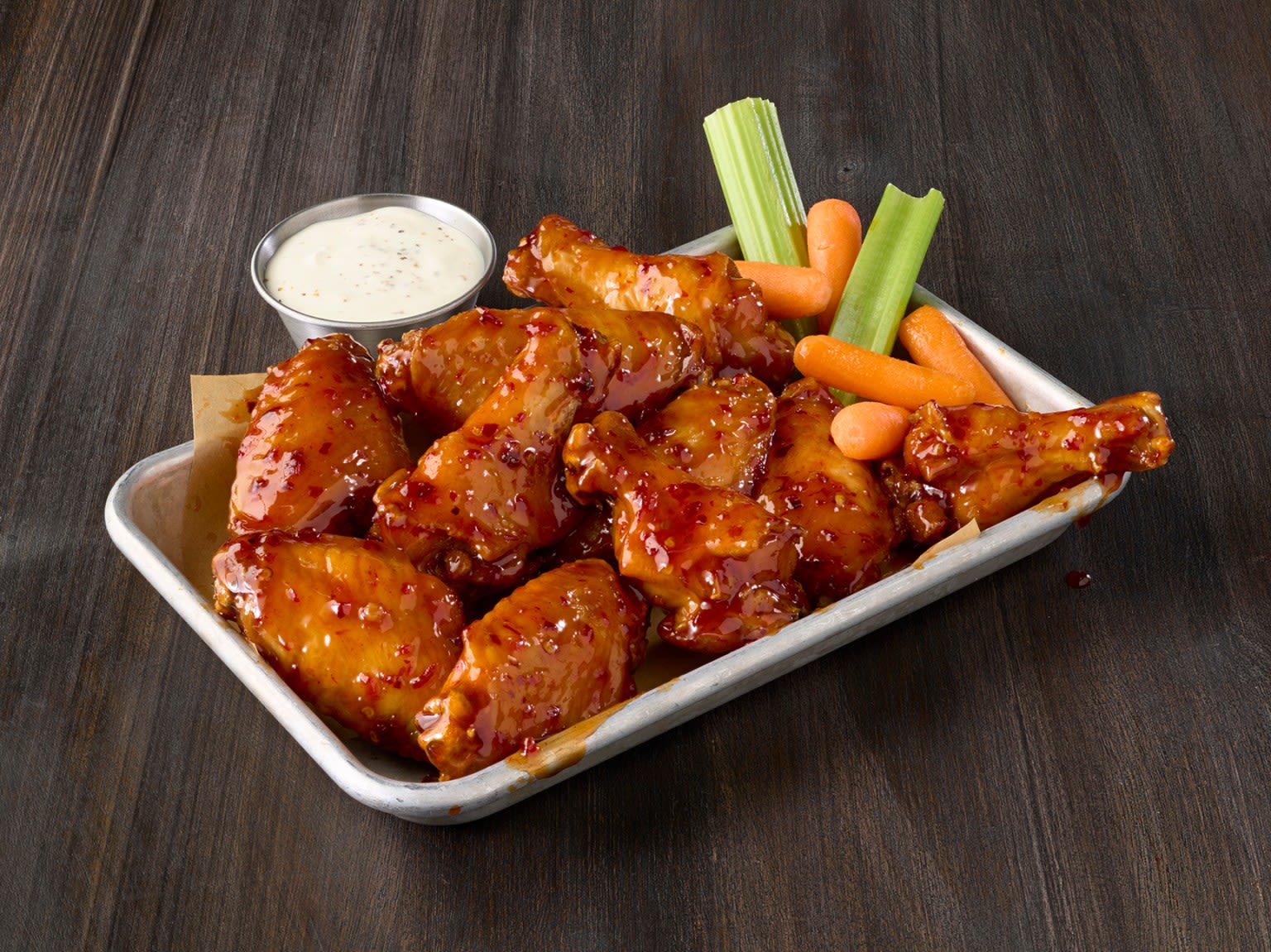 New Buffalo Wild Wings sauces kindle a craving for sweet heat
